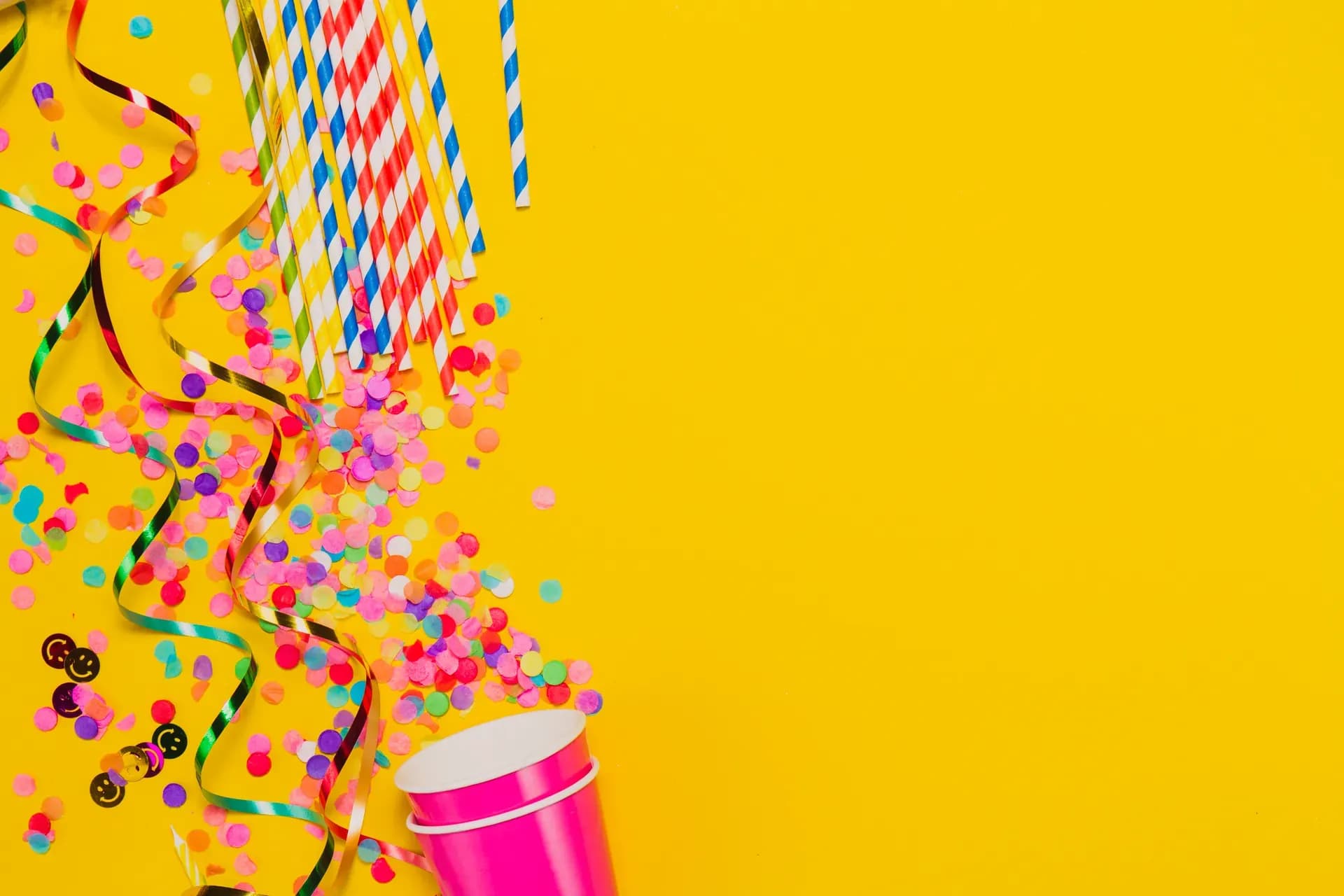 Colorful birthday glasses and party decorations