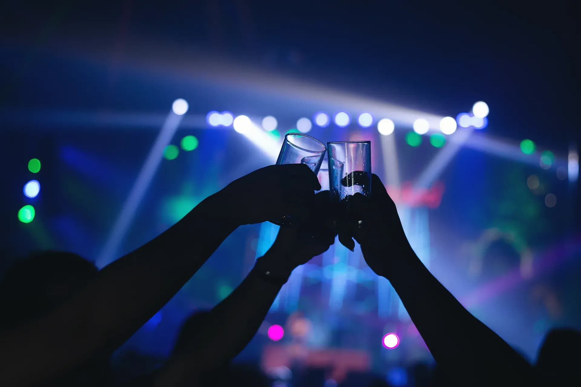 Friends raising glasses at a party