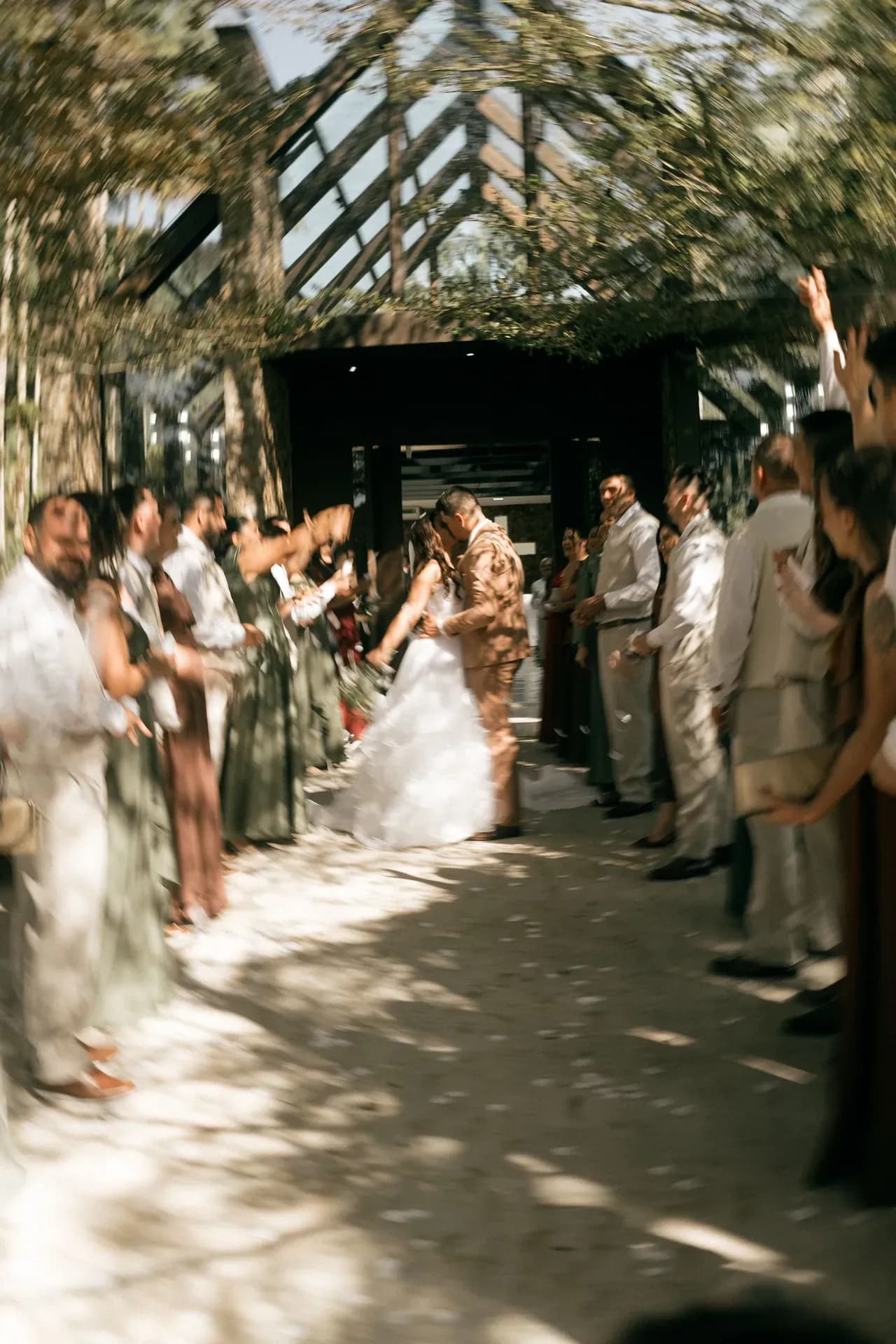 Wedding guests celebrating together outdoors